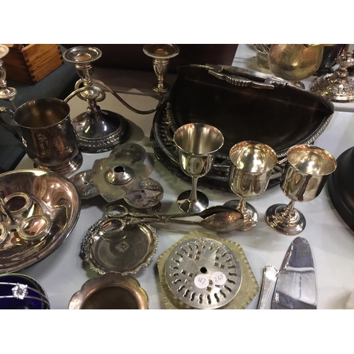 495 - A QUANTITY OF SILVER PLATED ITEMS TO INCLUDE, GOBLETS, CANDLEABRA, PLATES, POTS, ETC