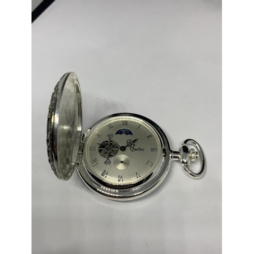 538 - A WHITE METAL RISING MOON POCKET WATCH SEEN WORKING BUT NO WARRANTY