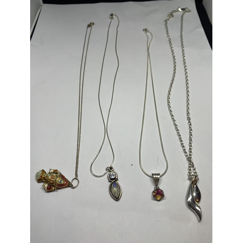 551 - FOUR MARKED SILVER NECKLACES WITH PENDANTS TO INCLUDE A FISH, STONE PENDANT ETC