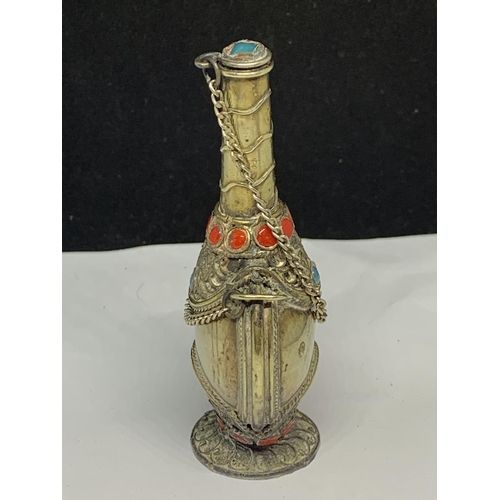 564 - AN ORNATE WHITE METAL ASIAN PERFUME BOTTLE