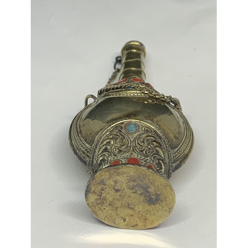 564 - AN ORNATE WHITE METAL ASIAN PERFUME BOTTLE