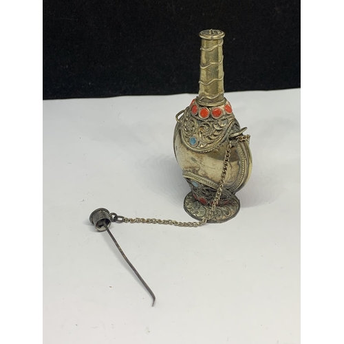 564 - AN ORNATE WHITE METAL ASIAN PERFUME BOTTLE