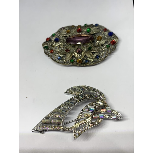 606 - FOUR LARGE DECORATIVE BROOCHES