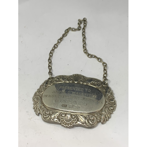 629 - A HALLMARKED BIRMINGHAM SILVER ENGRAVED DECANTER LABEL