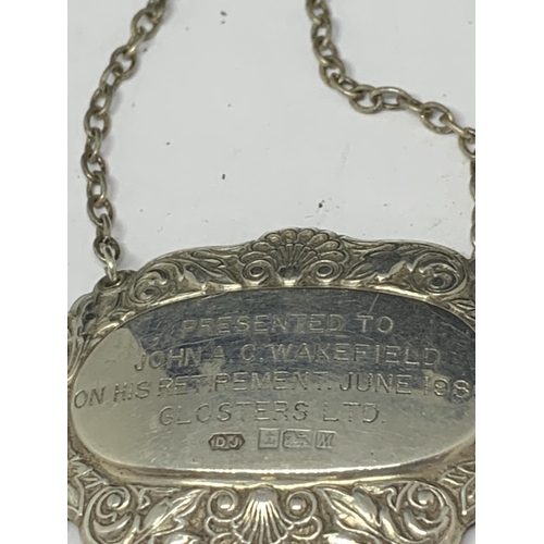 629 - A HALLMARKED BIRMINGHAM SILVER ENGRAVED DECANTER LABEL