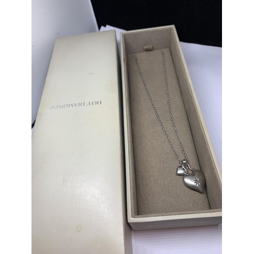 636 - A BOXED HOT DIAMONDS DOUBLE HEART PENDANT IN A PRESENTATION BOX