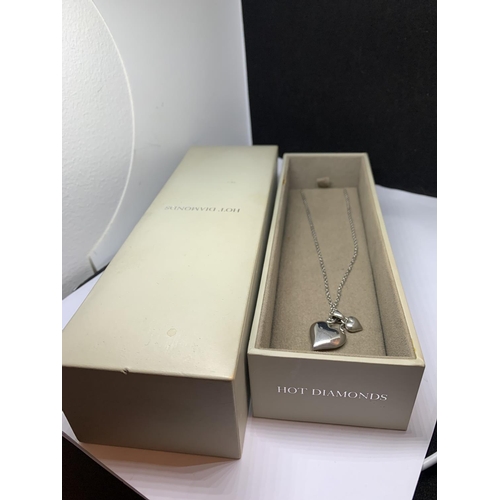 636 - A BOXED HOT DIAMONDS DOUBLE HEART PENDANT IN A PRESENTATION BOX