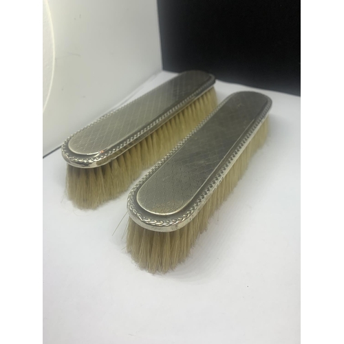 650 - A PAIR OF HALLMARKED BIRMINGHAM SILVER BACKED BRUSHES