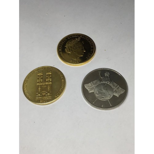 668 - THREE COMMEMORATIVE COINS