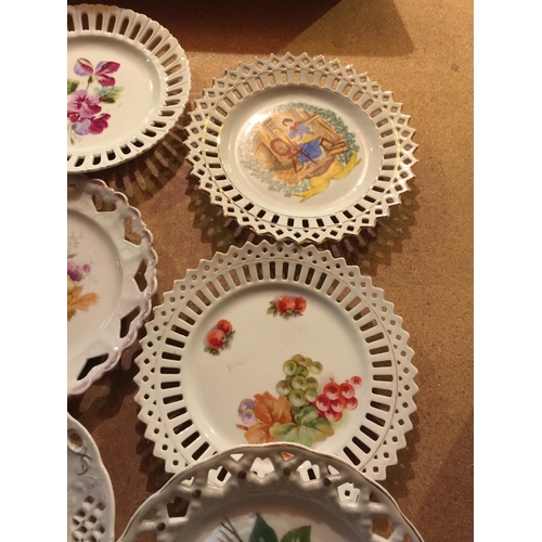 805 - SEVEN CABINET RIBBON PLATES (NO RIBBON) WITH FLORAL DECORATION