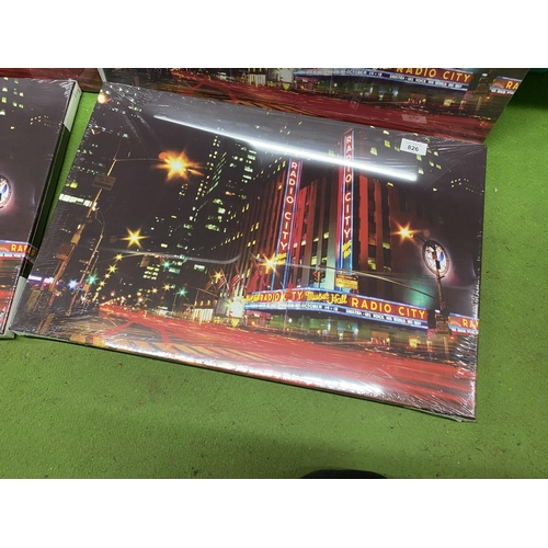 826 - FOUR CANVAS PRINTS TITLED 'CITY LIGHTS' SIZE 60CM X 40CM