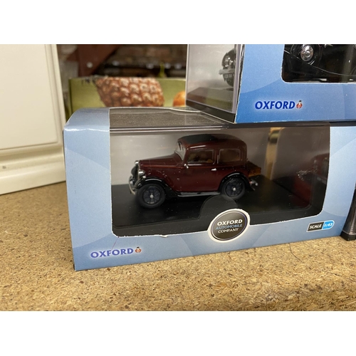 840 - THREE BOXED OXFORD DIE CAST MODELS TO INCLUDE A SCALE 1:43 BLACK JAGUAR, AN AUSTIN RUBY SALOON AND A... 