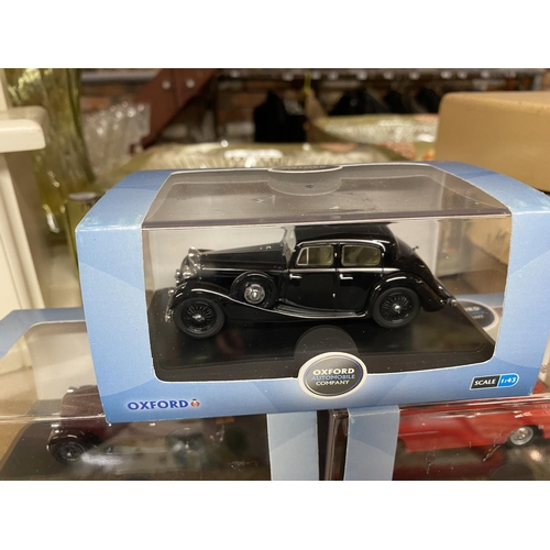 840 - THREE BOXED OXFORD DIE CAST MODELS TO INCLUDE A SCALE 1:43 BLACK JAGUAR, AN AUSTIN RUBY SALOON AND A... 