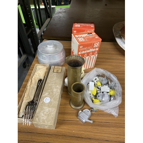 925 - TWO CANDLE HOLDERS MADE FROM MILITARY SHELLS, CANDLES, A TOBACCO TIN, BOX OF FORKS, ETC