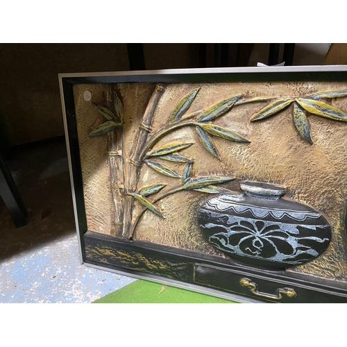 978 - A FRAMED 3D PICTURE OF BAMBOO AND POTS ON A TABLE