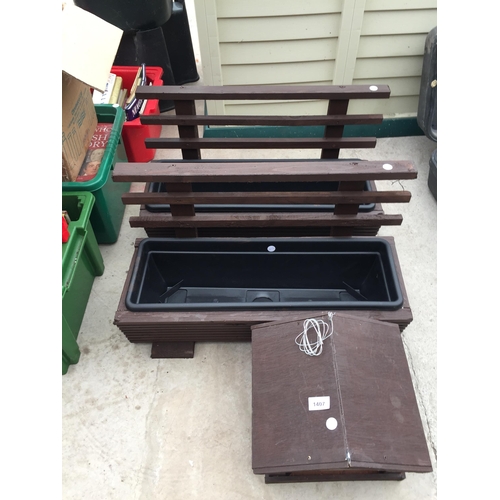 1407 - TWO WOODEN TROUGH PLANTERS AND A WOODEN BIRD TABLE TOP