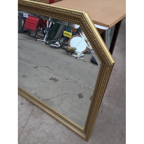 1591 - A LARGE DECORATIVE GILT FRAMED WALL MIRROR