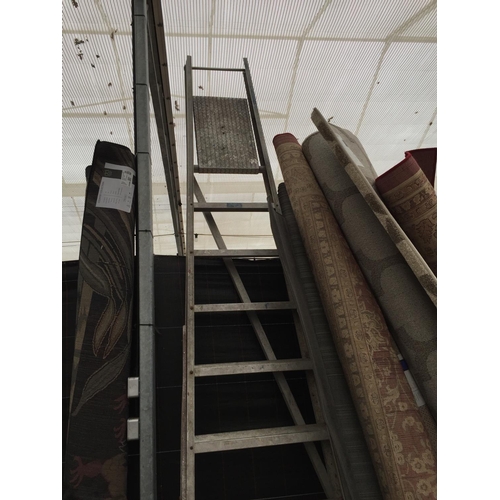 1597 - A LARGE ELEVEN RUNG ALUMINIUM STEP LADDER