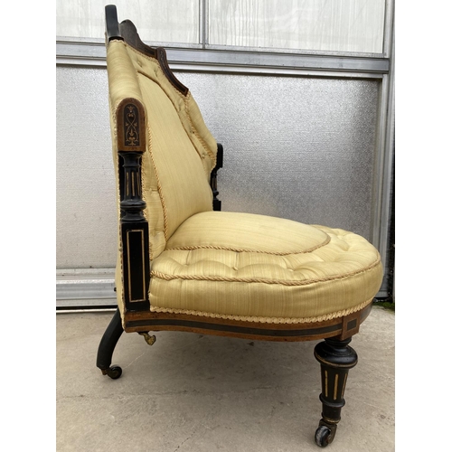 2002 - A VICTORIAN EBONISED NURSING CHAIR WITH BRASS CATCHES TO THE BACK, POSSIBLY ONCE PART OF A CONVERSAT... 