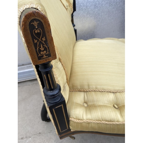 2002 - A VICTORIAN EBONISED NURSING CHAIR WITH BRASS CATCHES TO THE BACK, POSSIBLY ONCE PART OF A CONVERSAT... 