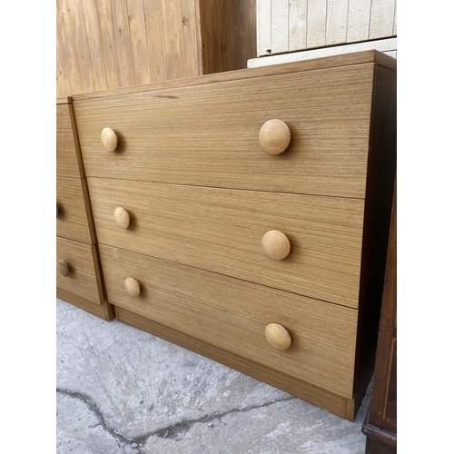 2087 - A PAIR OF RETRO TEAK CHESTS OF THREE DRAWERS, EACH 30