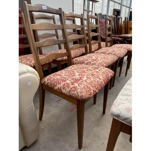 2102 - A SET OF RETRO TEAK G-PLAN LADDERBACK DINING CHAIRS AND EIGHT CHAIRS