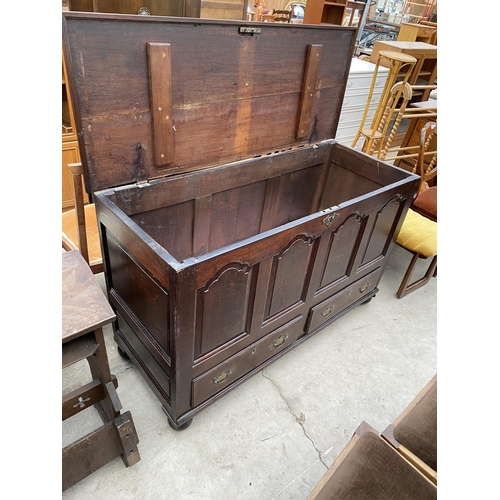 2119 - A GEORGE III OAK BLANKET CHEST WITH FOUR ARCHED PANELS AND TWO DRAWERS TO THE BASE, 54