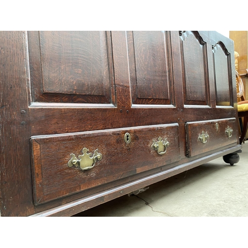 2119 - A GEORGE III OAK BLANKET CHEST WITH FOUR ARCHED PANELS AND TWO DRAWERS TO THE BASE, 54