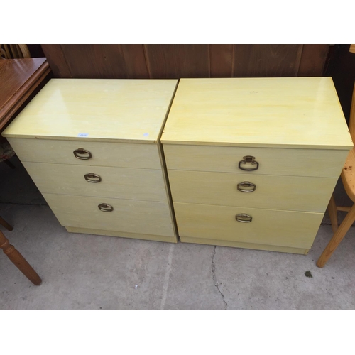 2140 - A PAIR OF CREAM MODERN THREE DRAWER CHESTS, 23.5