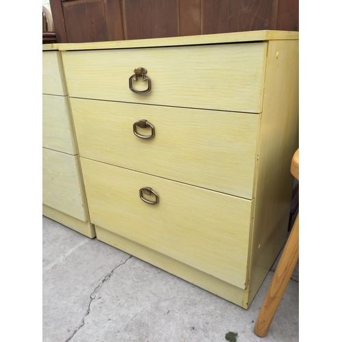 2140 - A PAIR OF CREAM MODERN THREE DRAWER CHESTS, 23.5