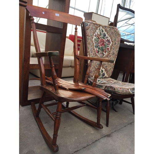 2180 - AN ERCOL STYLE FIRESIDE CHAIR AND FARMHOUSE ROCKING CHAIR