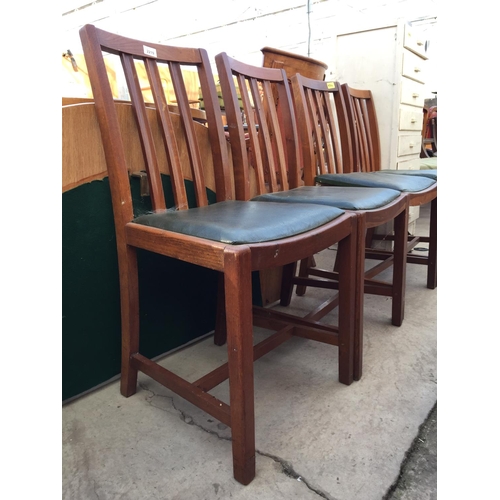 2219 - A SET OF FOUR OAK DINING CHAIRS