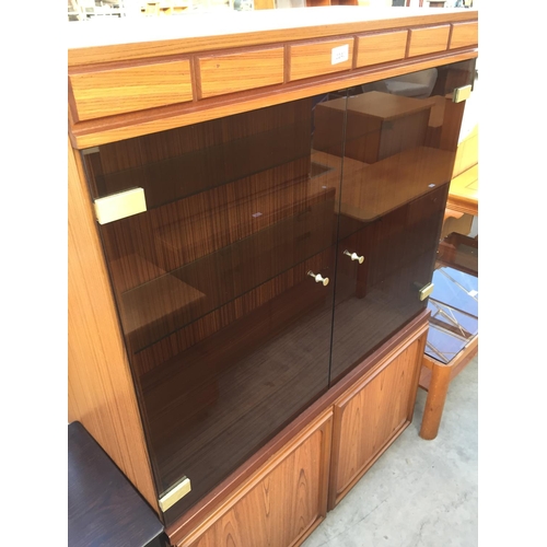 2240 - A TEAK EFFECT LOUNGE UNIT WITH SMOKED GLASS DOORS