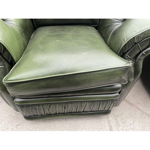 2399 - A PAIR OF GREEN LEATHER BUTTON-BACK EASY CHAIRS