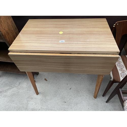 2404 - A FORMICA TOP DROP LEAF TABLE