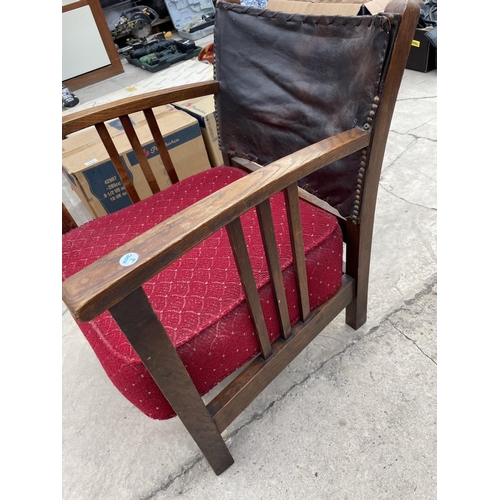 2486 - A PARKER KNOLL STYLE FIRESIDE CHAIR AND ROCKING CHAIR AND MID 20TH CENTURY LOW OAK ARMCHAIR