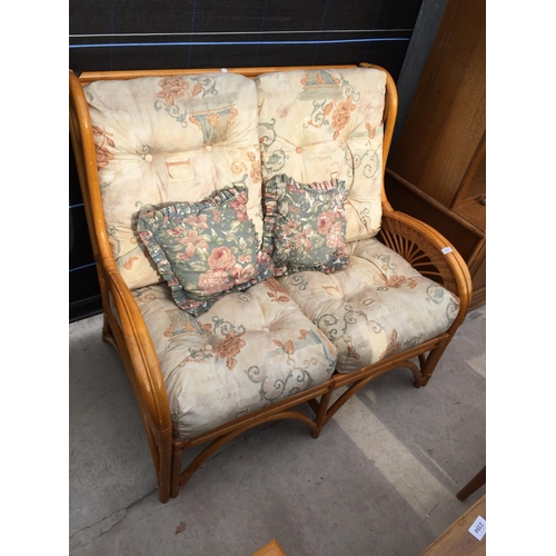 2378 - A BAMBOO CONSERVATORY TWO SEATER SETTEE