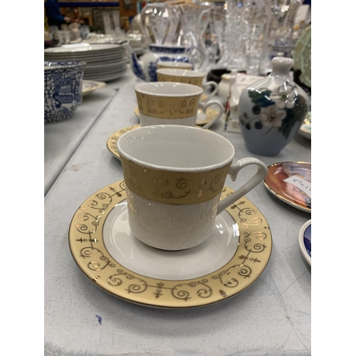 195 - A COLLECTION OF CERAMICS AND CHINA TO INCLUDE CUPS AND SAUCERS, PLATES, COTTAGES, THIMBLES, ETC