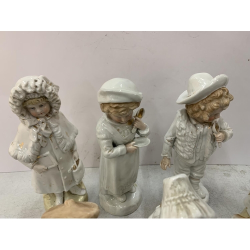237 - SIX STONEWARE FIGURINES OF BOYS AND GIRLS