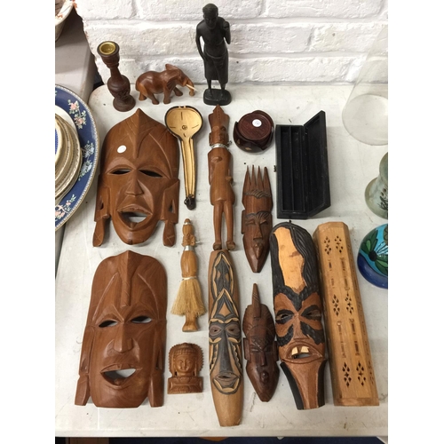 278A - A QUANTITY OF TREEN ITEMS TO INCLUDE AFRICAN MASKS, FIGURES, BOX, COASTERS, ETC