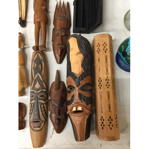 278A - A QUANTITY OF TREEN ITEMS TO INCLUDE AFRICAN MASKS, FIGURES, BOX, COASTERS, ETC