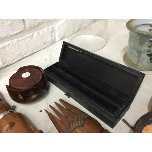 278A - A QUANTITY OF TREEN ITEMS TO INCLUDE AFRICAN MASKS, FIGURES, BOX, COASTERS, ETC