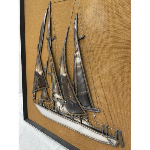 12 - A LARGE METAL ART COLLAGE OF A SAILING BOAT 80CM X 70CM