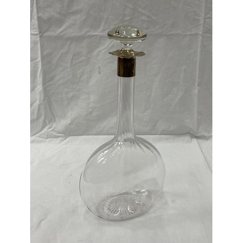 15 - AN UNUSUAL GLASS DECANTER WITH A HALLMARKED LONDON SILVER COLLAR