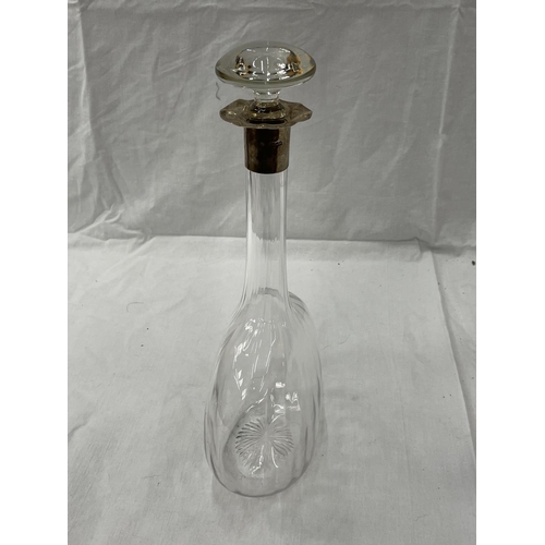 15 - AN UNUSUAL GLASS DECANTER WITH A HALLMARKED LONDON SILVER COLLAR