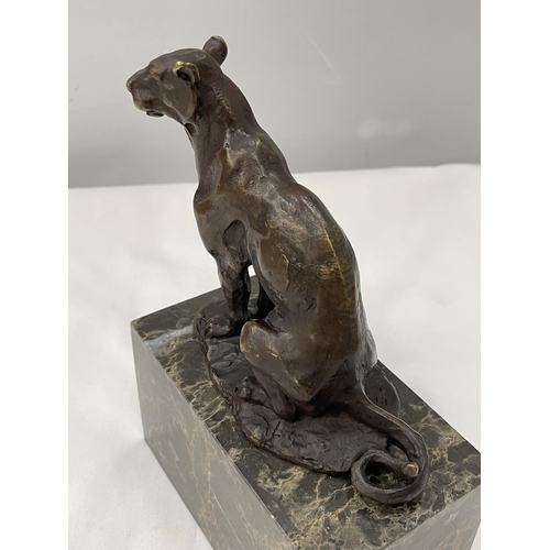 20A - A BRONZE PANTHER ON A MARBLE BASE SIGNED CARVIN HEIGHT 18CM