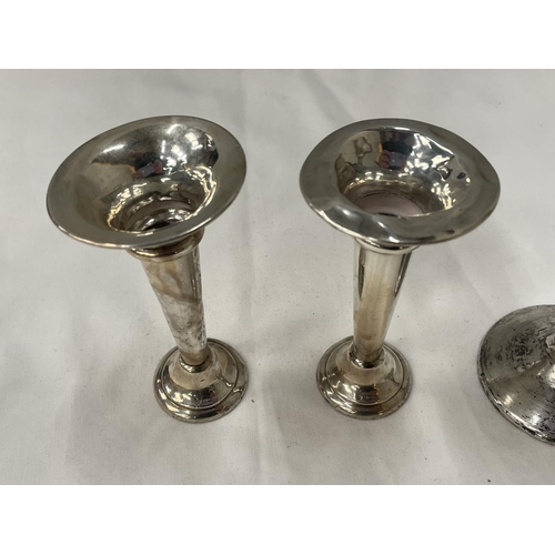 22 - THREE HALLMARKED BIRMINGHAM SILVER ITEMS TO INCLUDE A CANDLESTICK AND A PAIR OF BUD VASES