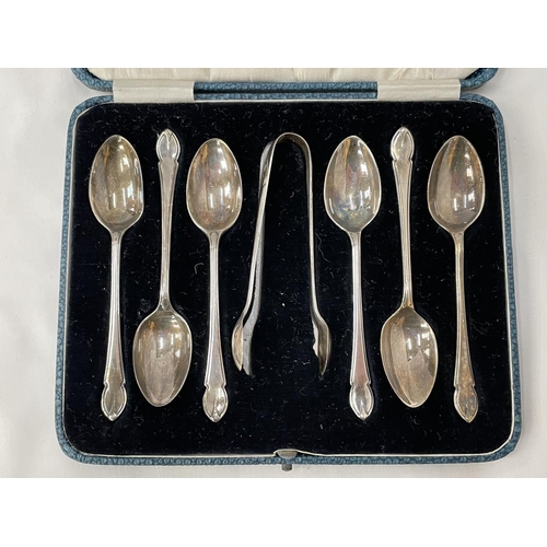 26 - A BOXED SET OF HALLMARKED SHEFFIELD SILVER COMPRISING SIX TEASPOONS AND A PAIR OF SUGAR NIPS