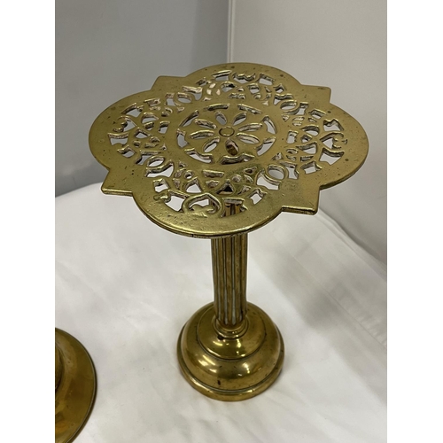 28 - A GREOGIAN BRASS ADJUSTABLE HEIGHT WIG STAND AND A FURTHER BRASS STAND