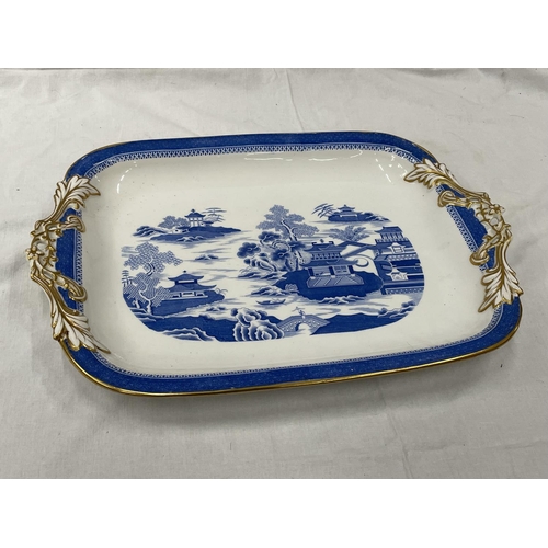 29 - A LARGE RECTANGULAR MEAT PLATTER WITH AN ORIENTAL DESIGN 47CM X 33CM